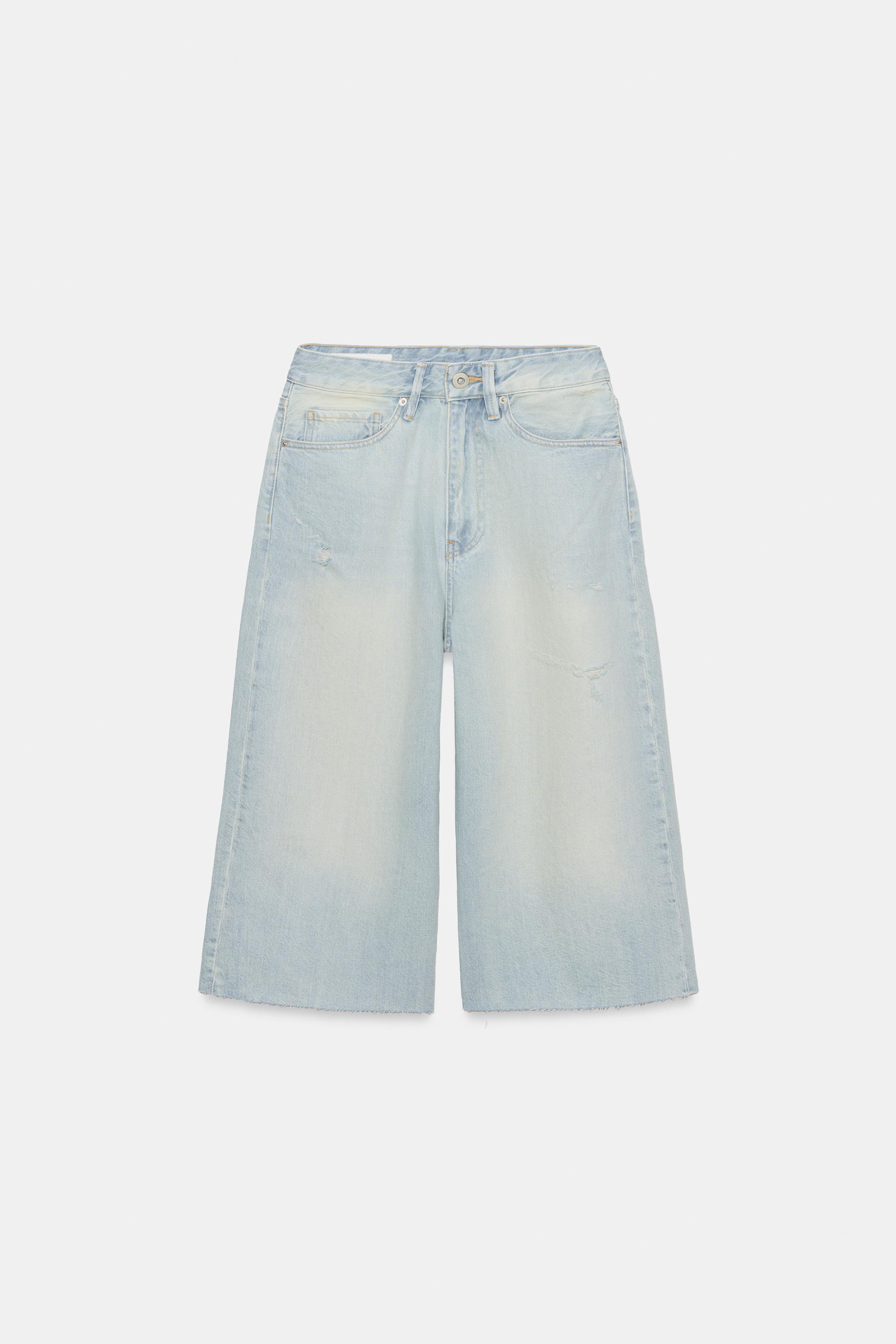 MID-RISE RIPPED DENIM JORTS